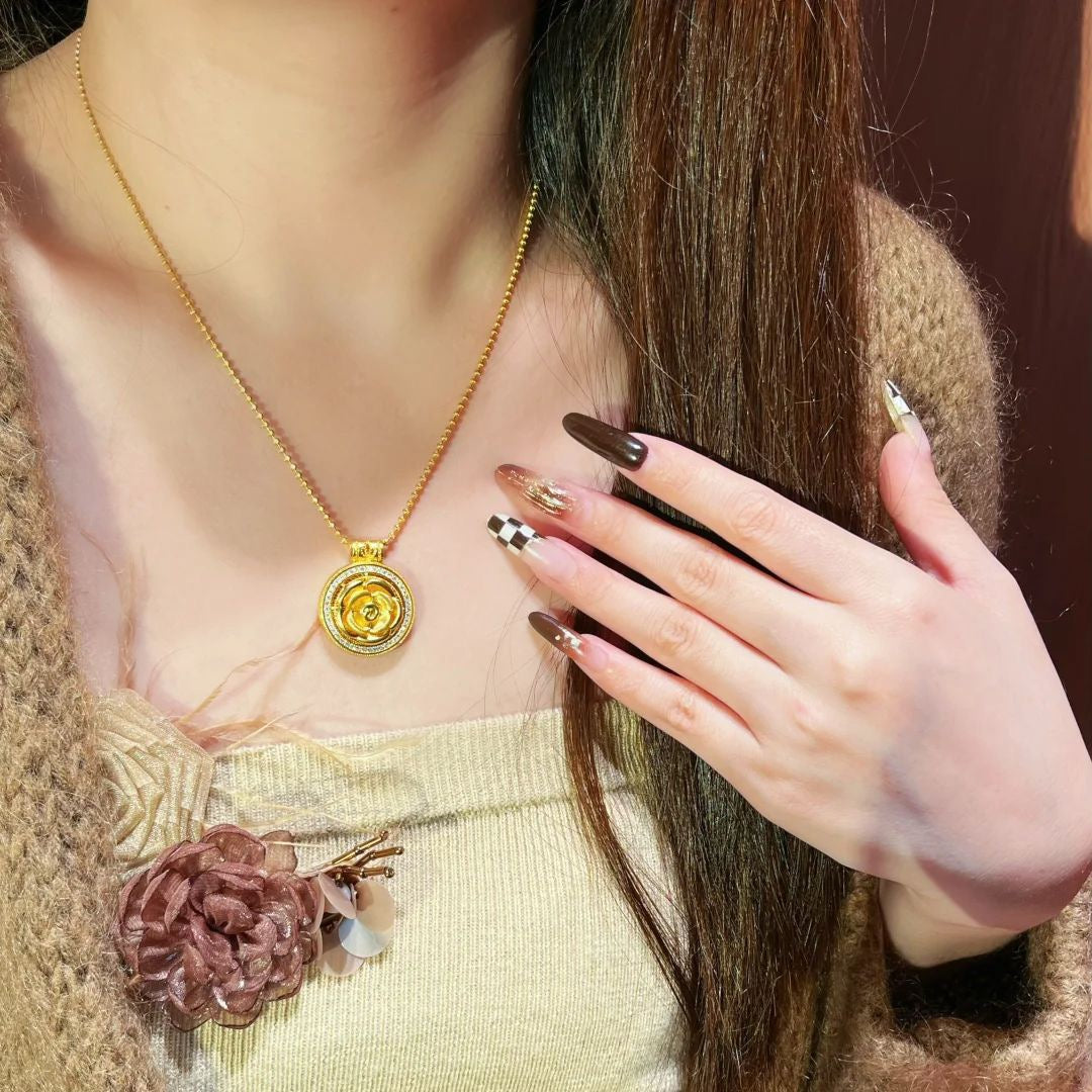 Brushed and Forged Pendant Necklace with Rose and Compass Motifs